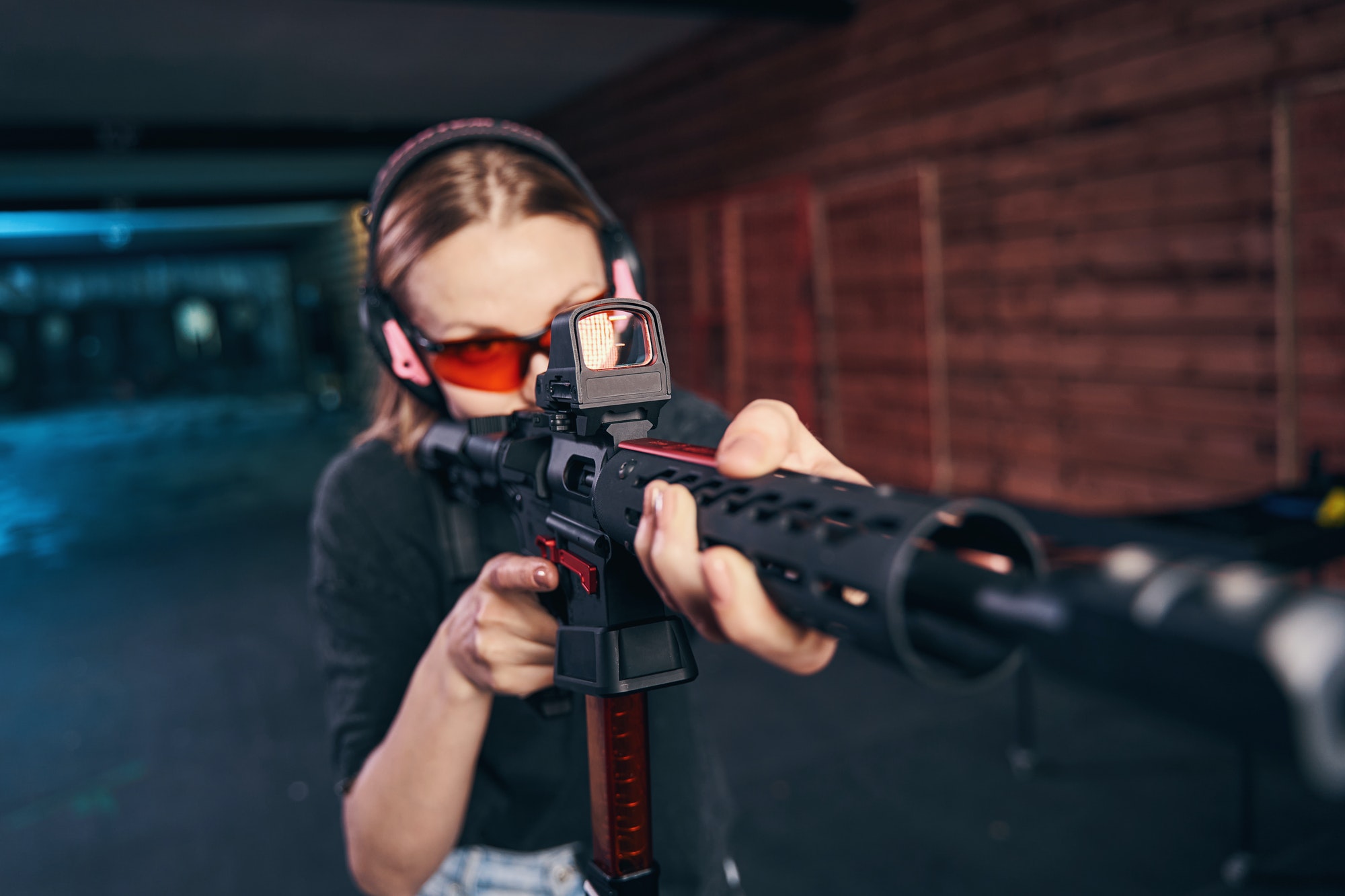 shooter-in-earmuffs-and-protective-eyewear-firing-a-weapon.jpg